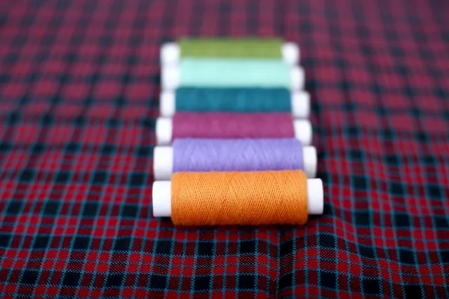 thread, embroidery, sewing, garment, fabric, manufacturing, reel, tailor, fashion, accessories, cloth, craft, design, industry, material, needlework, colorful, colors, crafts, multicolored, spool, yarn, clothing, tailoring, sewing thread. Chicago embroidery screen printing: a production workflow