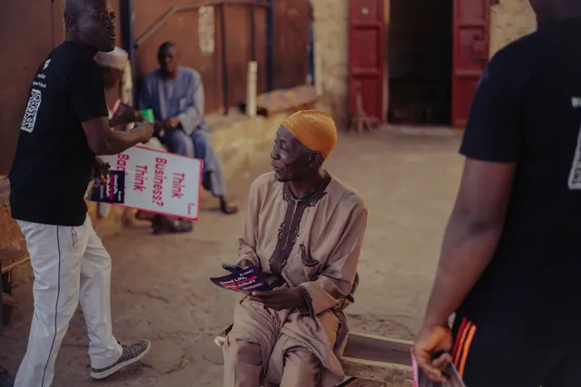 Local community engaging in business promotion with flyers and posters. Local partnership marketing: a practical guide for 2027