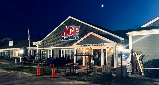 Nighttime view of the Eastham Hardware store, an Ace Hardware franchise location in Eastham, Massachusetts, with illuminated signage and storefront. Local partnership marketing for people who want the details