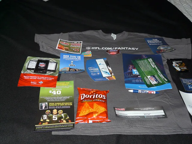From a tee-shirt to a Snickers bar, a Play 60 pen, a bag of Doritos, assorted coupons for play tickets ("Lombardi"), Verizon phones, Papa John's Pizza (and a magnet!), football cards, draft guide. Reviewing promotional product marketing: strengths, gaps and a verdict